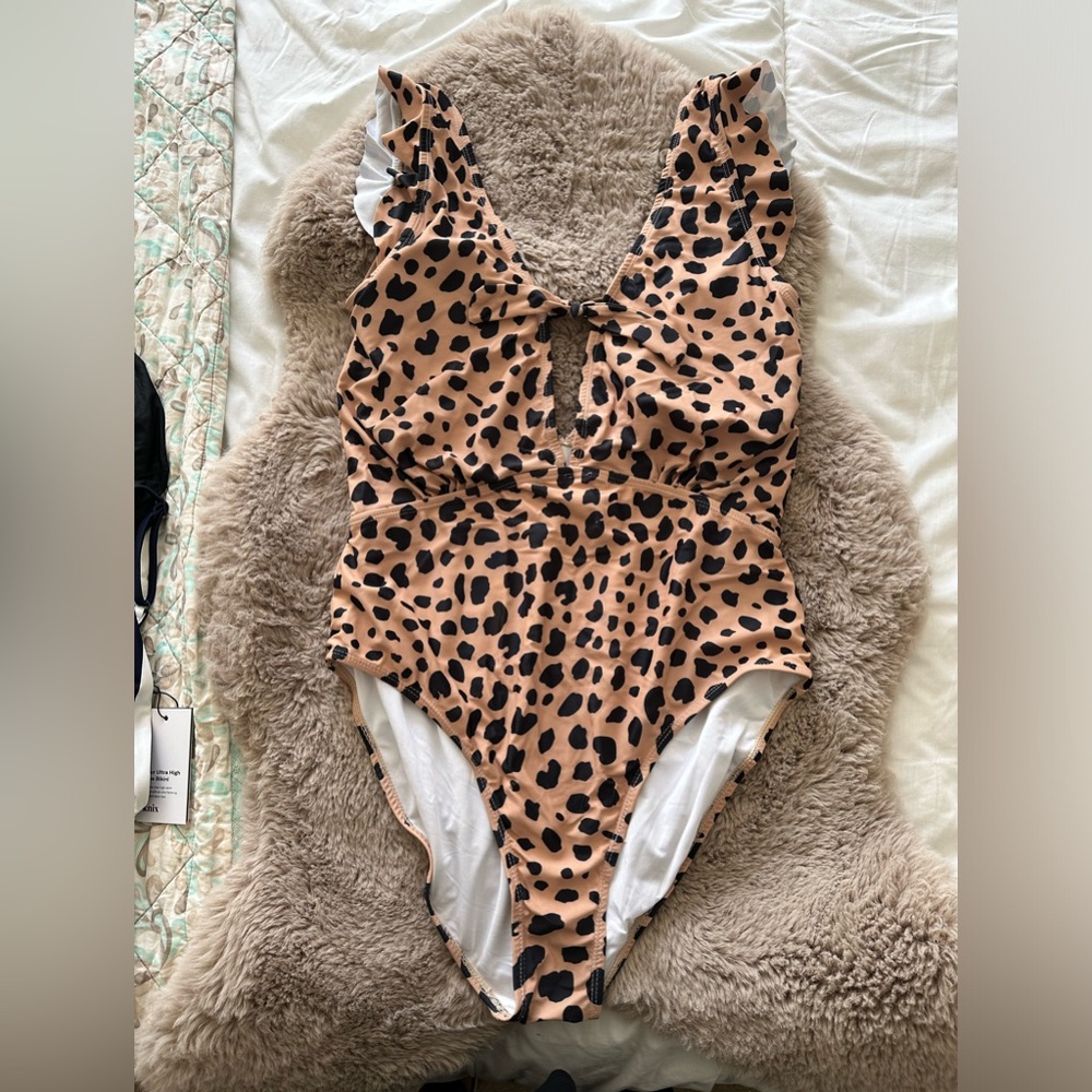 Leopard print plunge neck one piece bathing suit